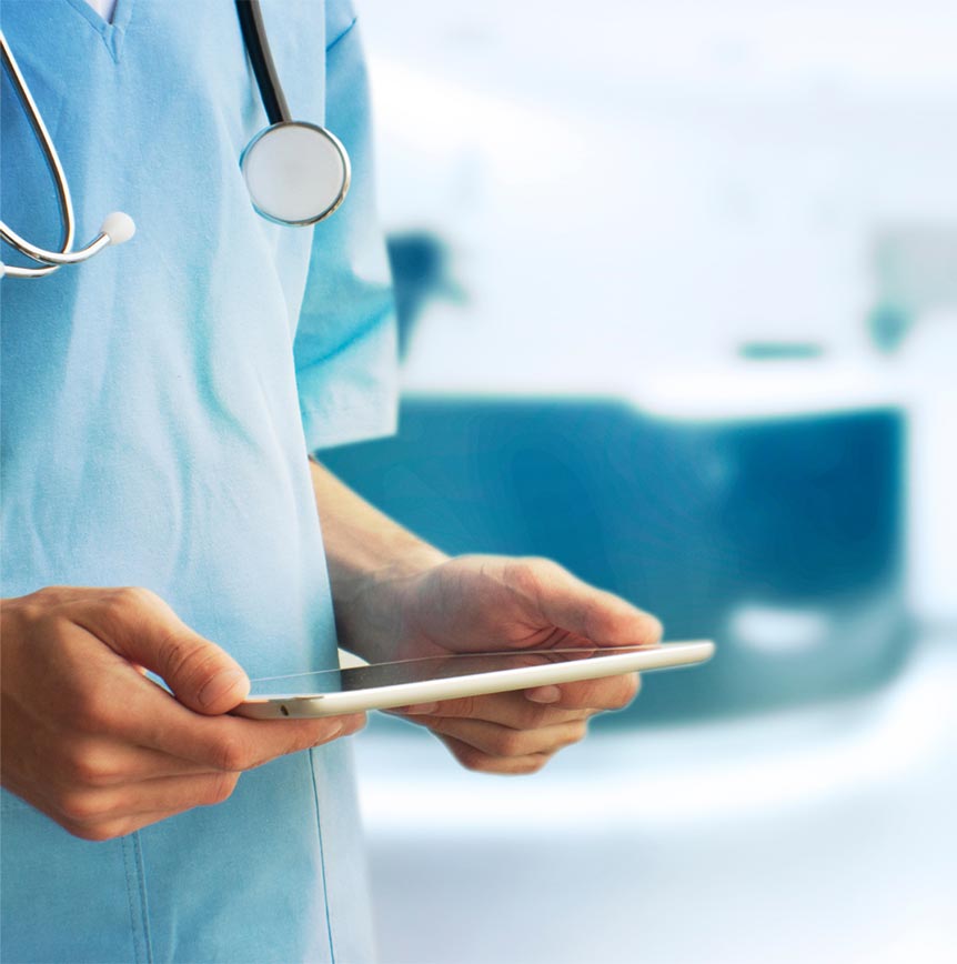 Medical Professional Looking At Tablet