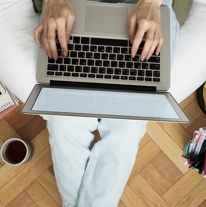 Person On Laptop At Home