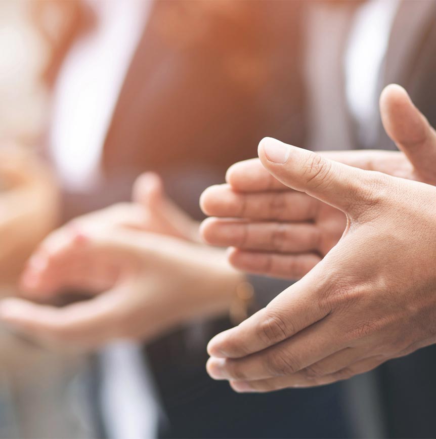 Multiple People Clapping Hands