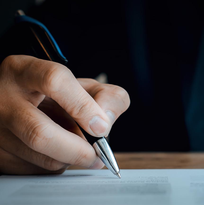 Employee Writing on Paper