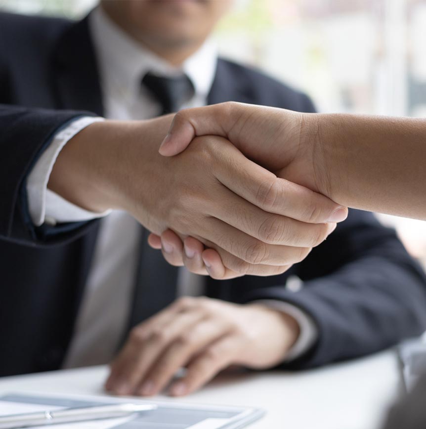 Two People Shaking Hands