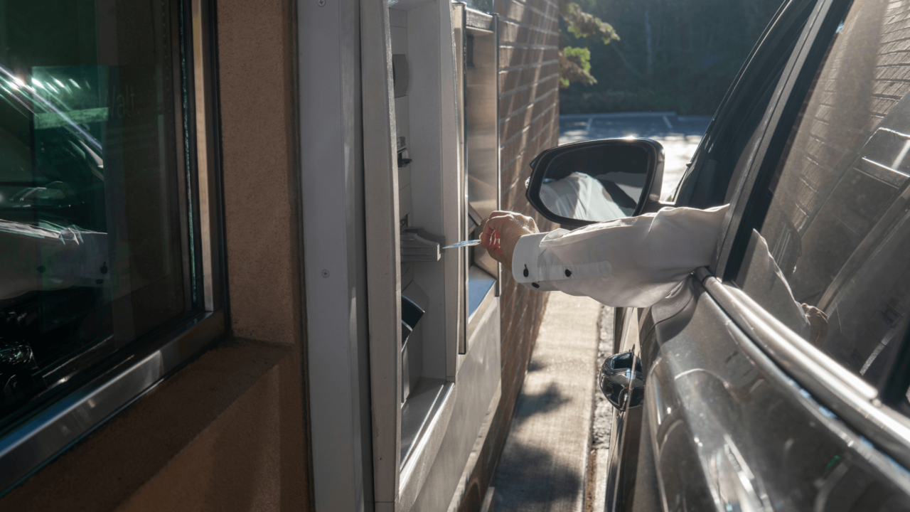 Person at drive thru ATM experiencing human centric design