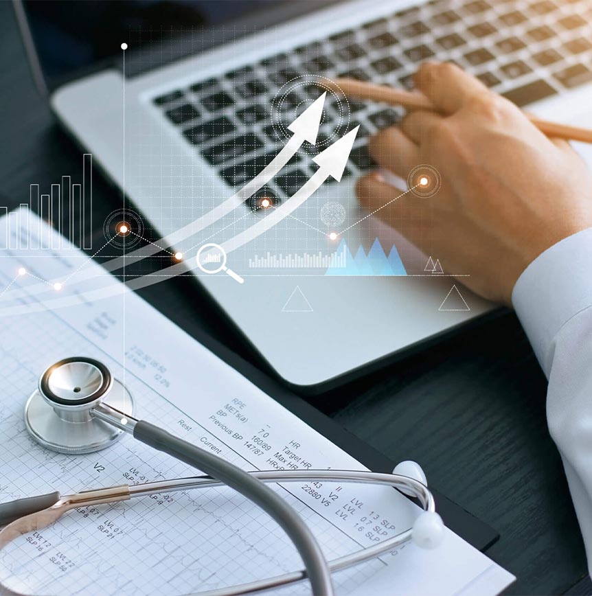 Person at laptop with medical equipment