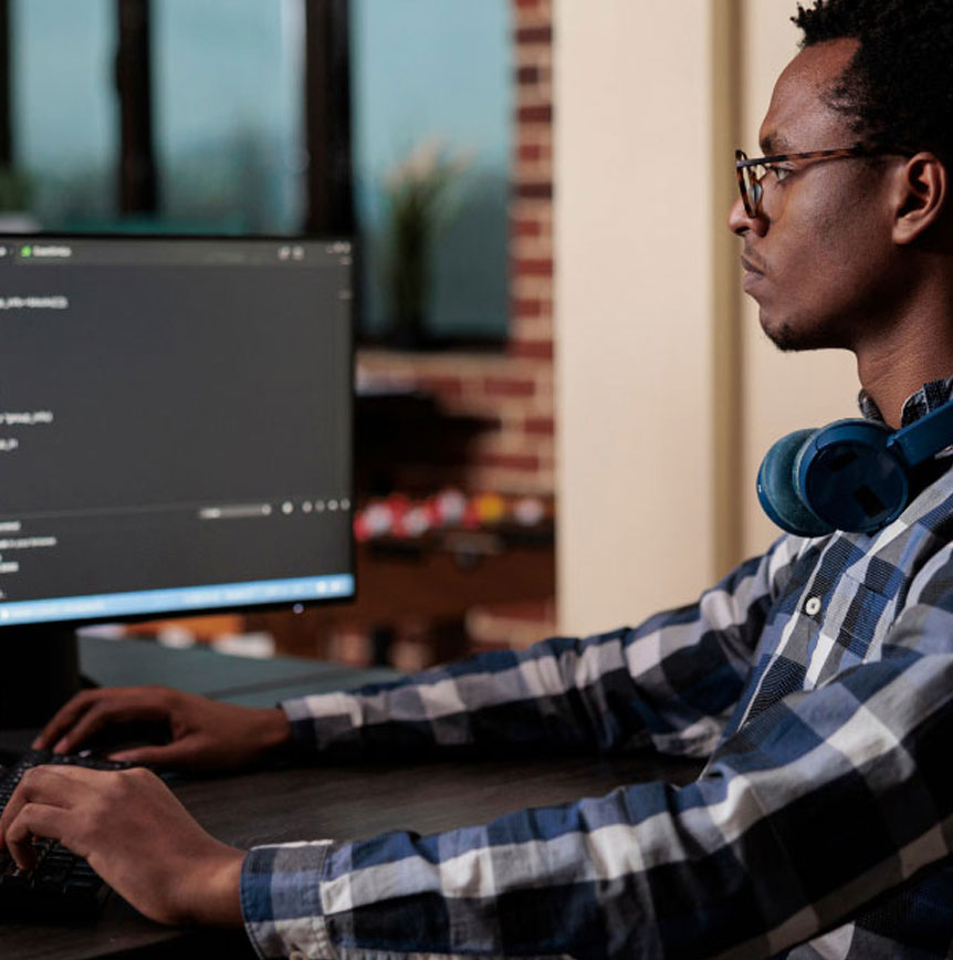 Cyber security worker at computer working