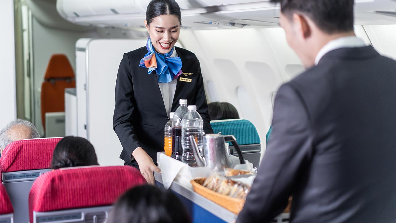 Flight attendants making sure passengers have an enjoyable flight experience