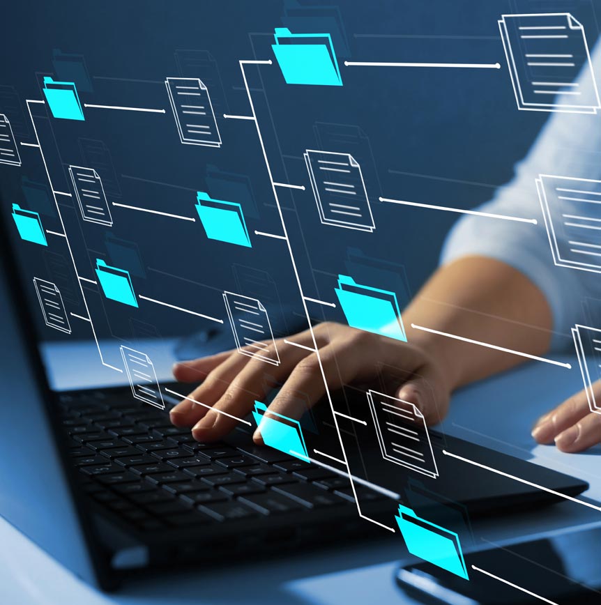 Person typing on a laptop with digital overlays of interconnected folders and documents, symbolizing data organization, system modernization, and scalable solutions for healthcare providers