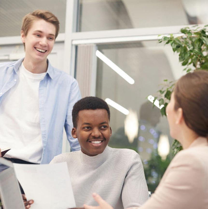 Interns Discussing Cybersecurity