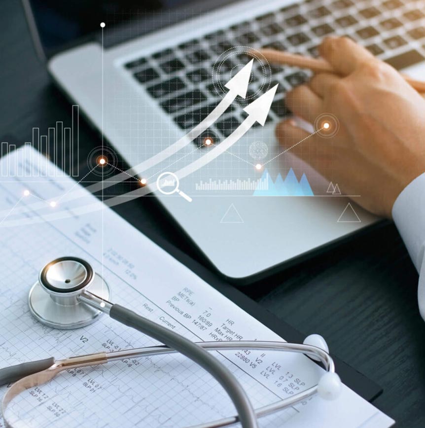 Doctor typing on laptop with stethoscope