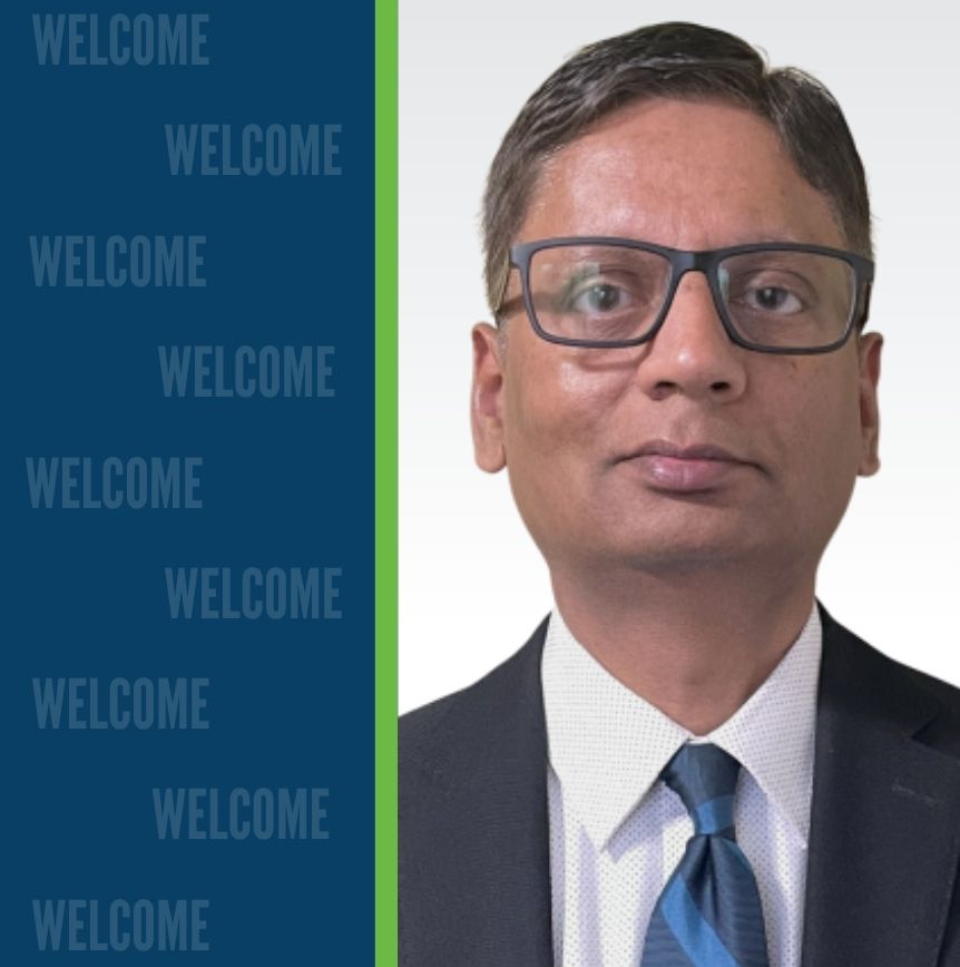 Professional headshot of Atul Singh in a suit and tie, positioned beside vertically stacked 'WELCOME' text in bold blue on a dark blue background.