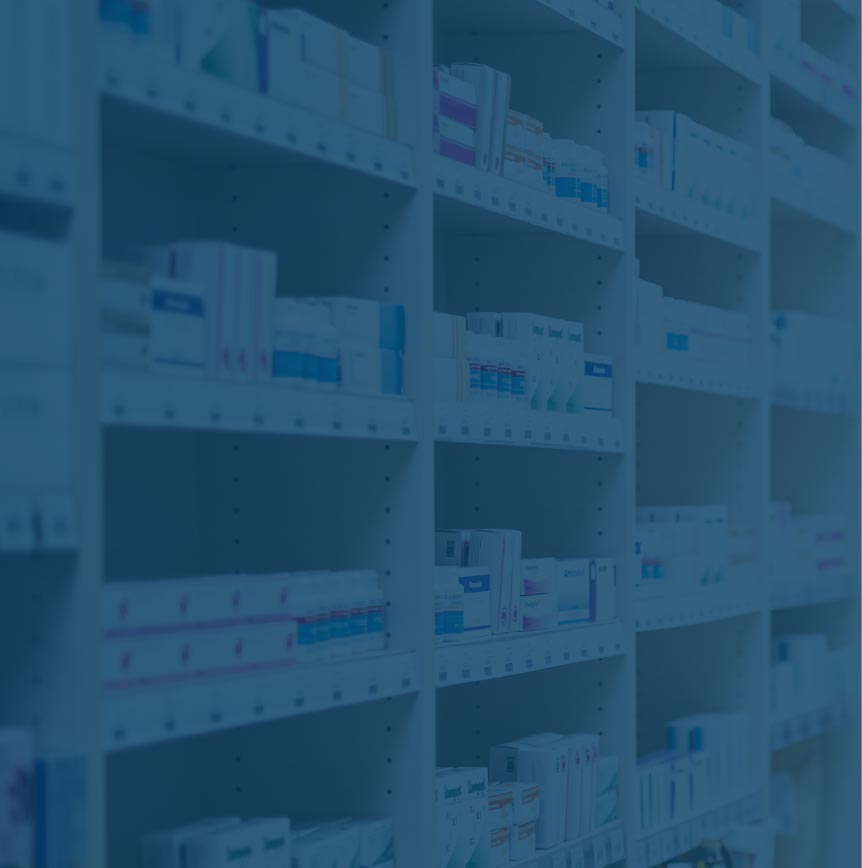 Stocked pharmacy shelves with a blue filter over the image
