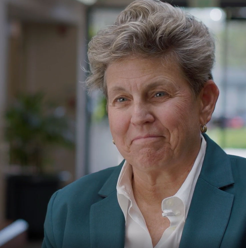 Tish Mossman speaking about teamwork at RELI Group